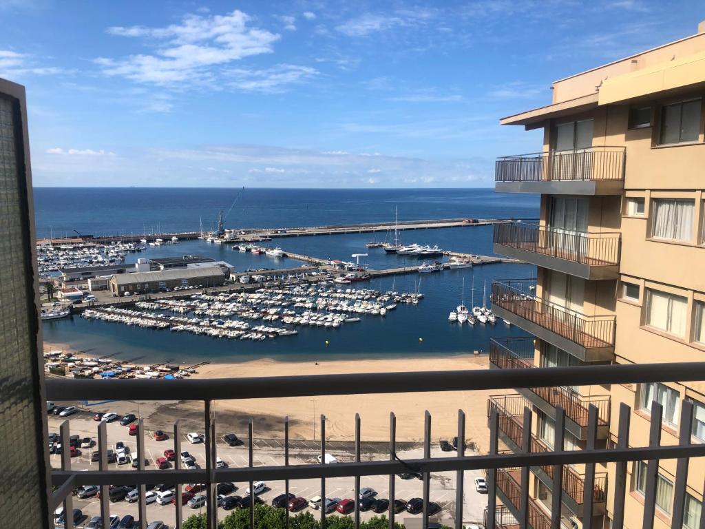 a view of a marina from a balcony of a condo at Apartamento Jaume II Palamós in Palamós