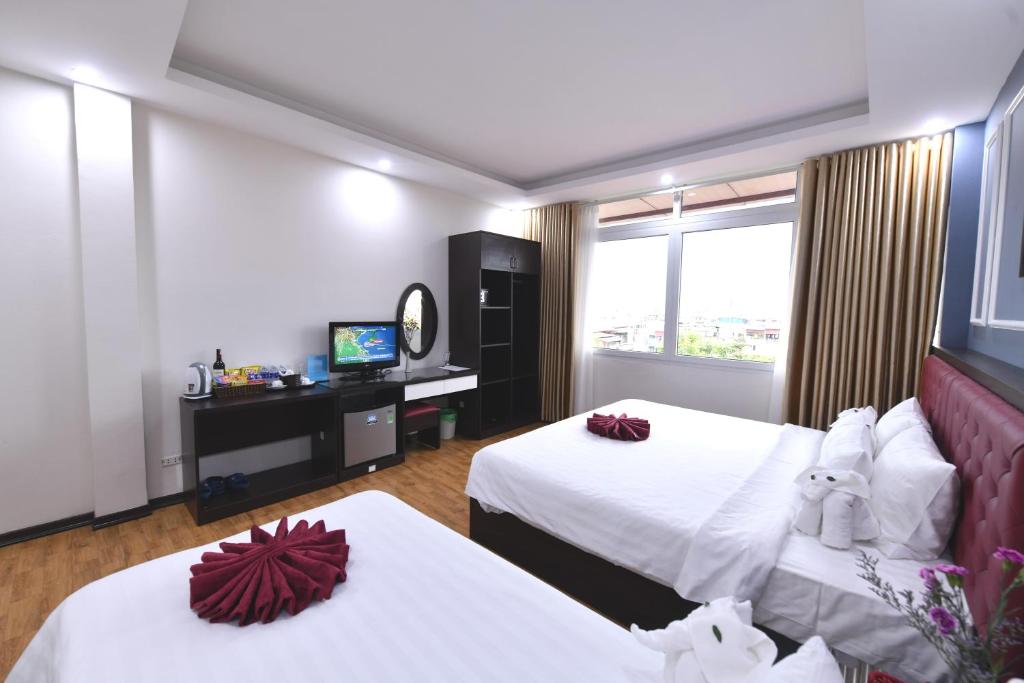 TV a/nebo společenská místnost v ubytování Hanoi Elpis Grand Hotel