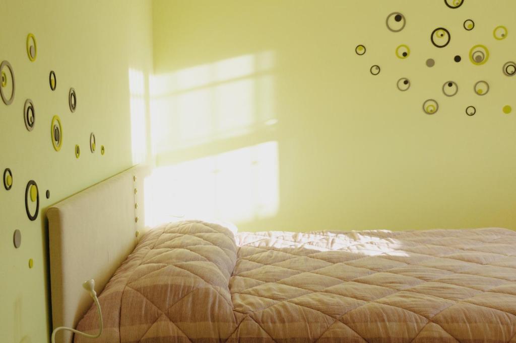 Postel nebo postele na pokoji v ubytování B&B Ca di me