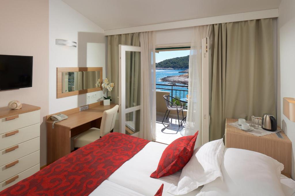 Posteľ alebo postele v izbe v ubytovaní Hotel Fortuna