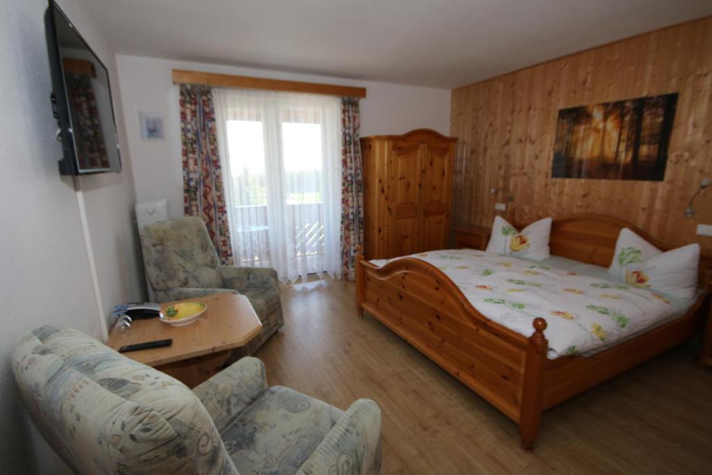 Postel nebo postele na pokoji v ubytování Hotel Charlott