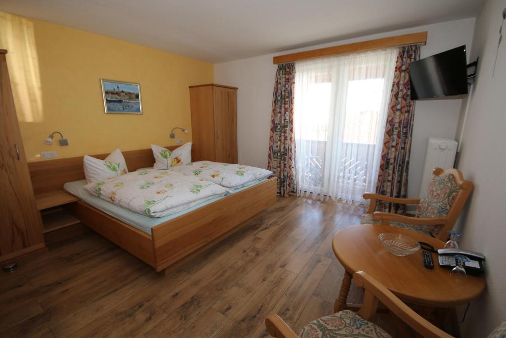 Postel nebo postele na pokoji v ubytování Hotel Charlott