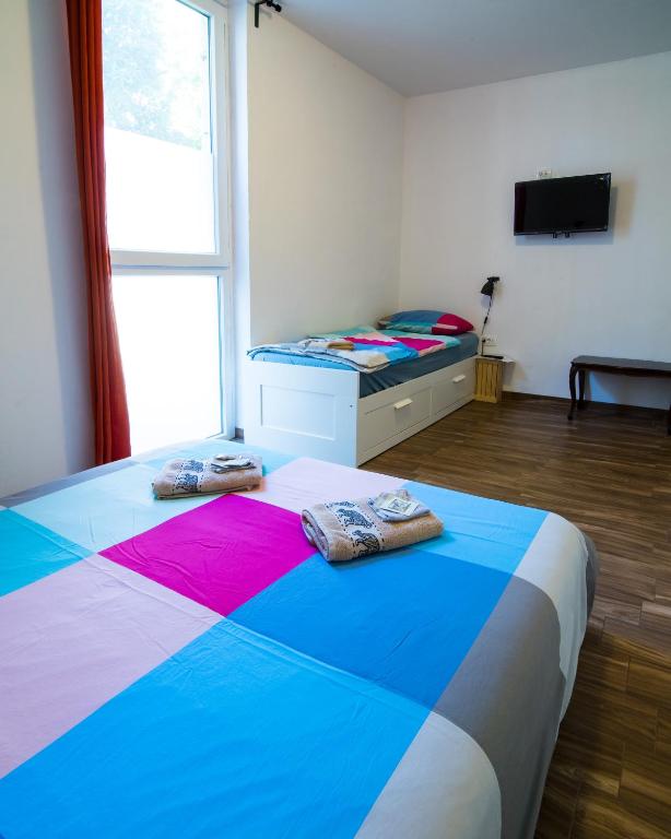 Postel nebo postele na pokoji v ubytování Sobe Argo Izola