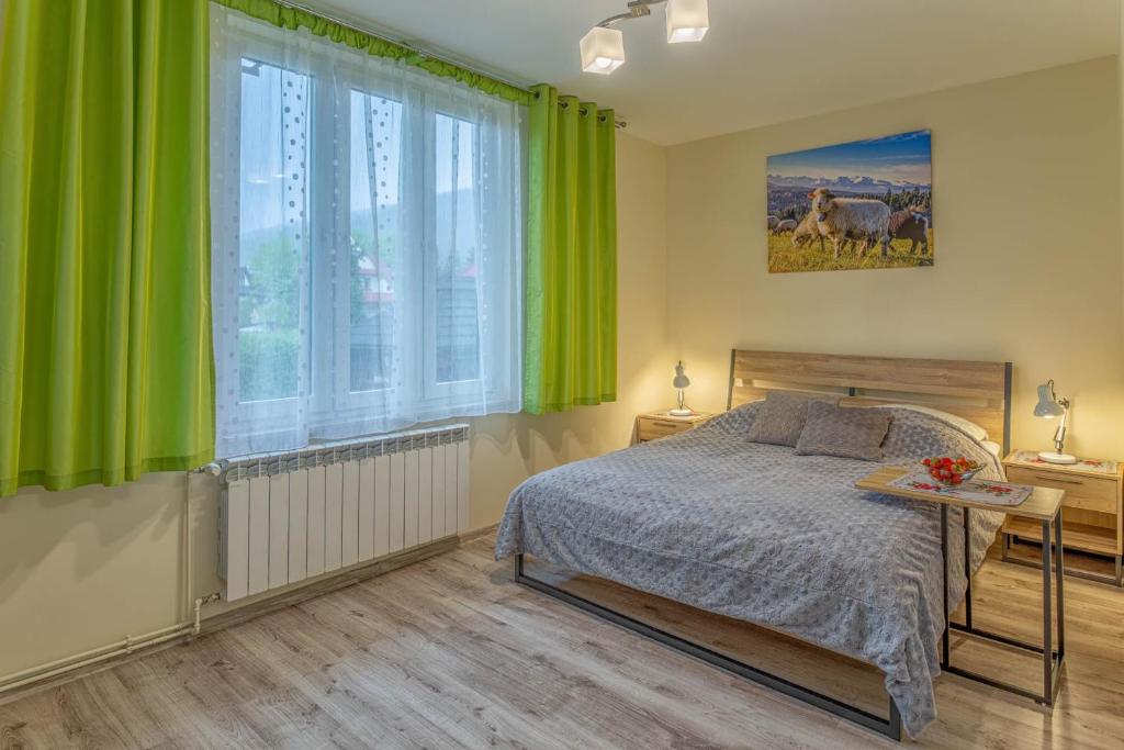 Posteľ alebo postele v izbe v ubytovaní Ballada 2
