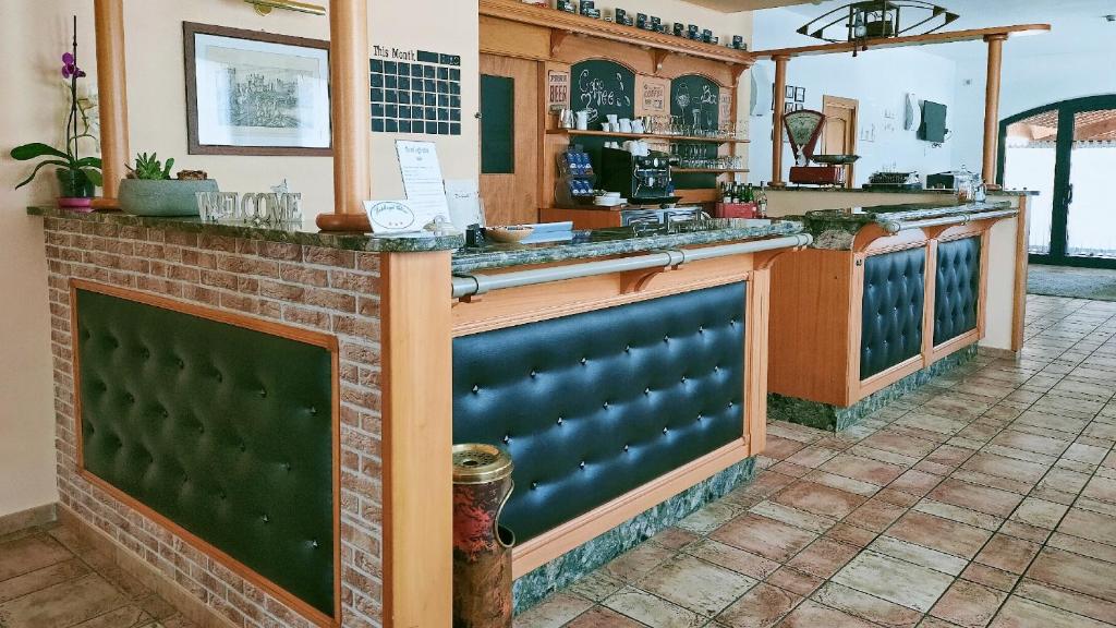 Kuchyň nebo kuchyňský kout v ubytování Hotel Agli Ulivi