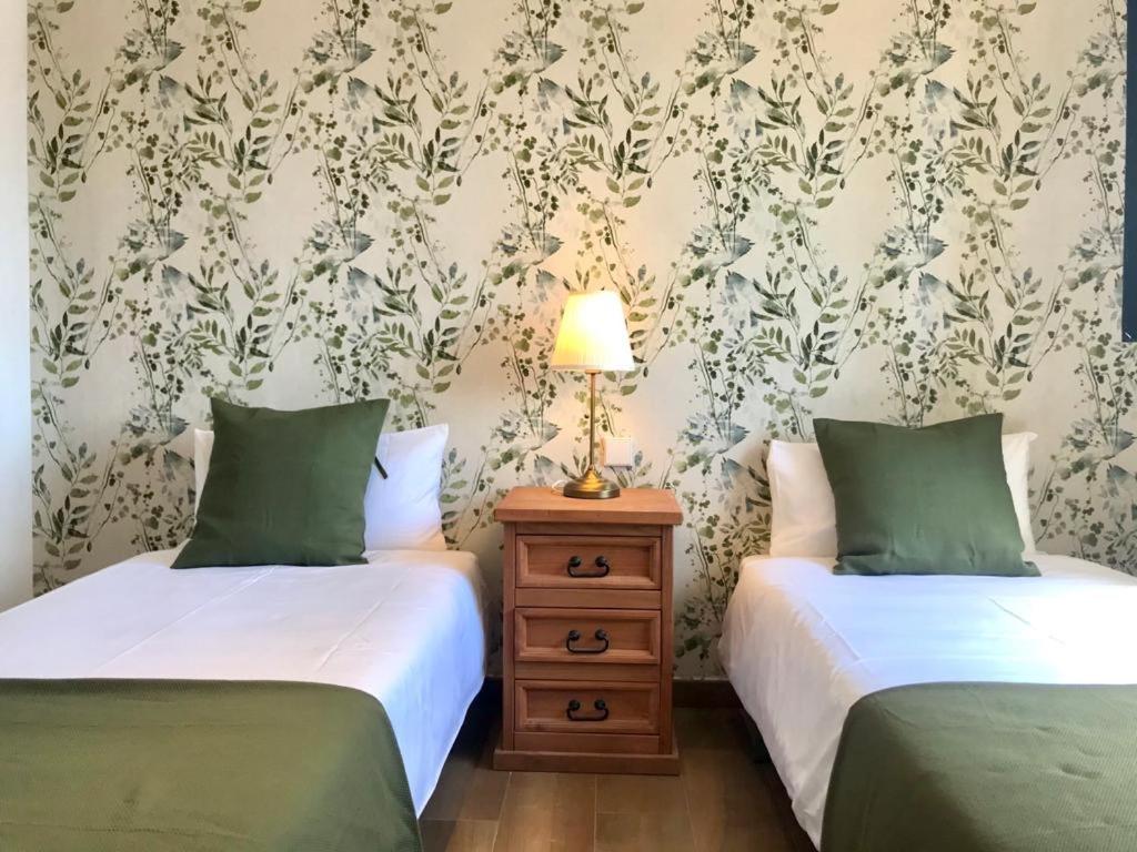 Posteľ alebo postele v izbe v ubytovaní Pedregalejo I & private terrace by ELE Apartments