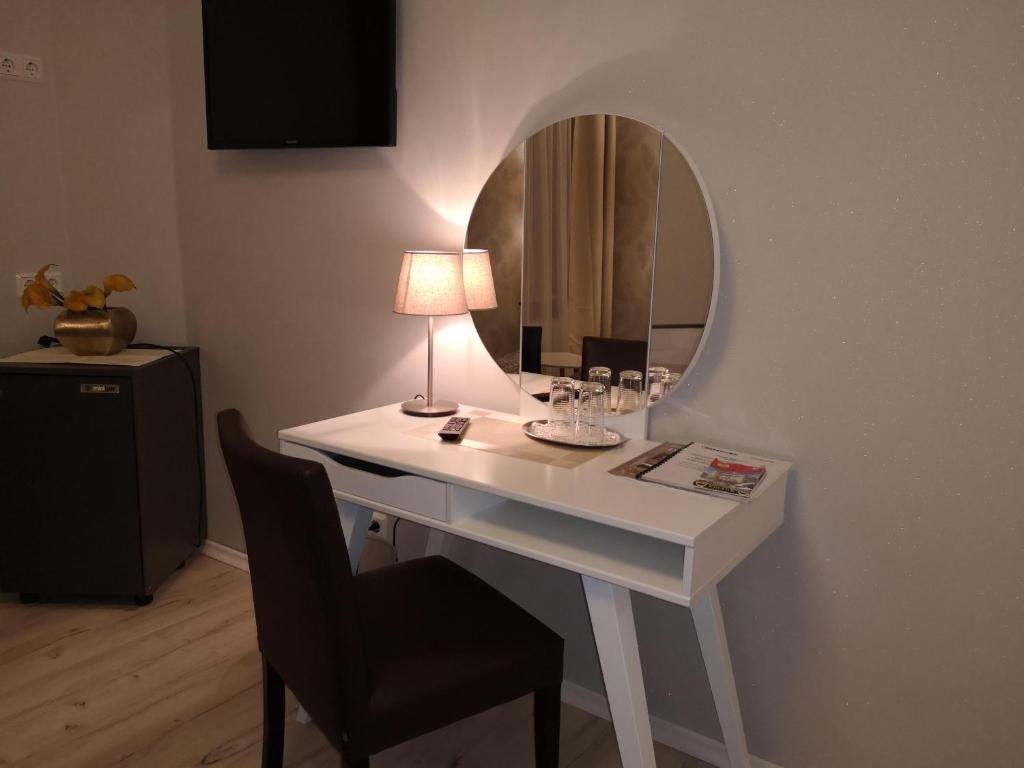 TV a/nebo společenská místnost v ubytování Hotel Löhr