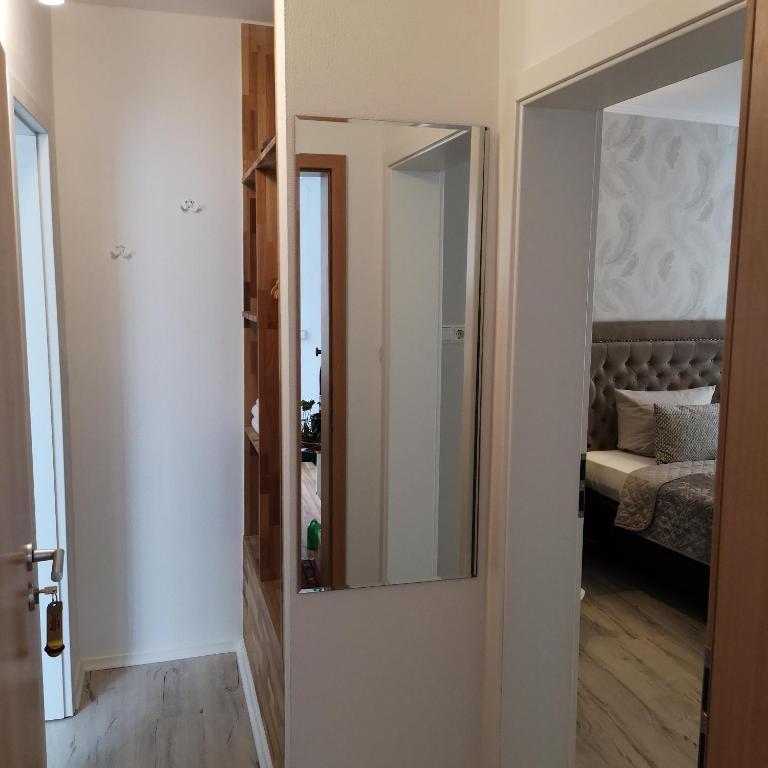 Postel nebo postele na pokoji v ubytování Hotel Löhr