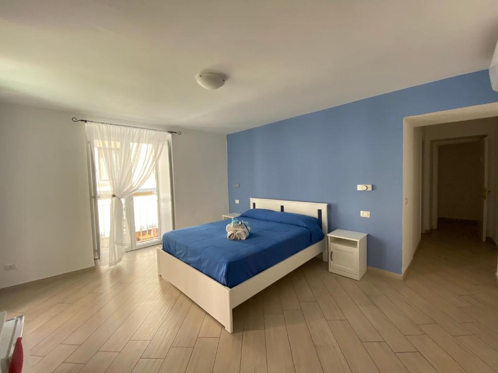 Postel nebo postele na pokoji v ubytování Historic Center Suite