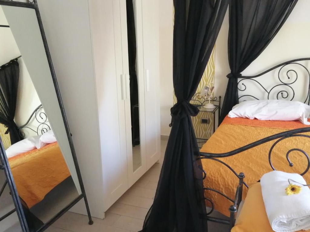 Posteľ alebo postele v izbe v ubytovaní Mamma Lucia