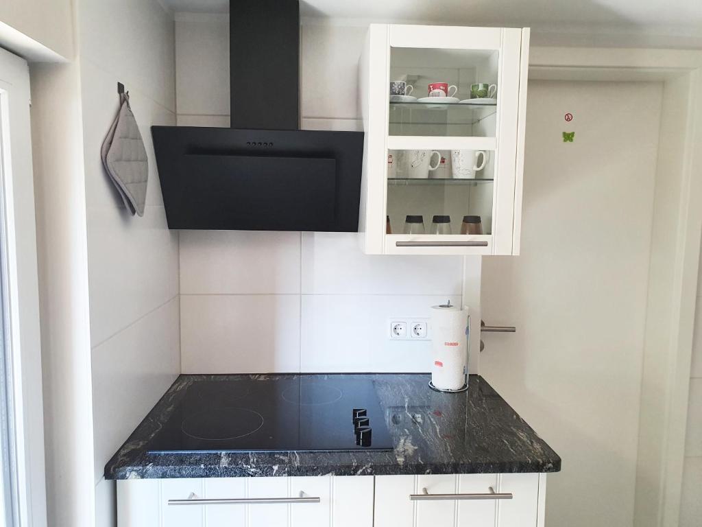 Kuchyň nebo kuchyňský kout v ubytování Monteur-Fremdenzimmer - Petit Quartier