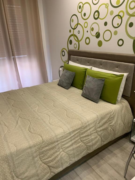 Łóżko lub łóżka w pokoju w obiekcie CEJM Apartments Merano