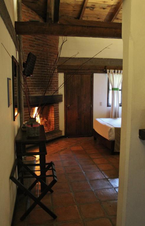 Postel nebo postele na pokoji v ubytování Spa Holistico Real Hotel