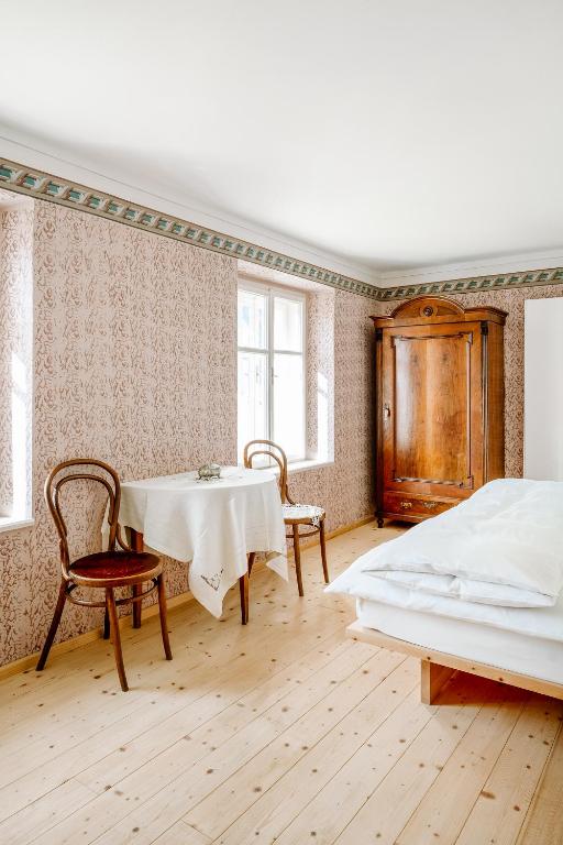 Postel nebo postele na pokoji v ubytování Zum Riesen Historic Refugium