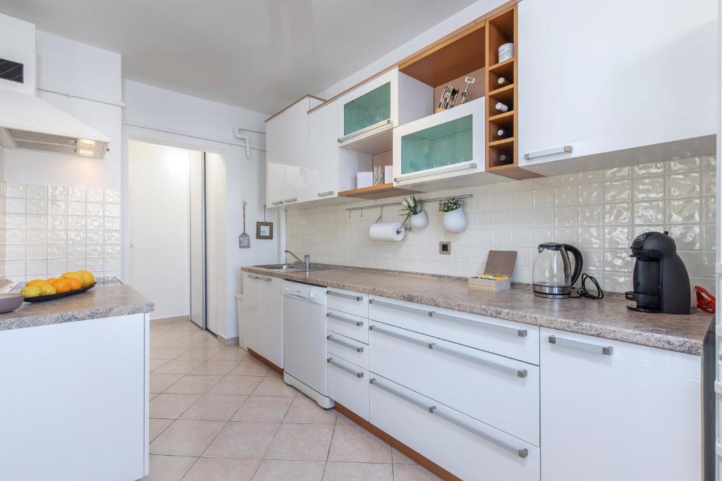 Kuchyň nebo kuchyňský kout v ubytování Apartment IN