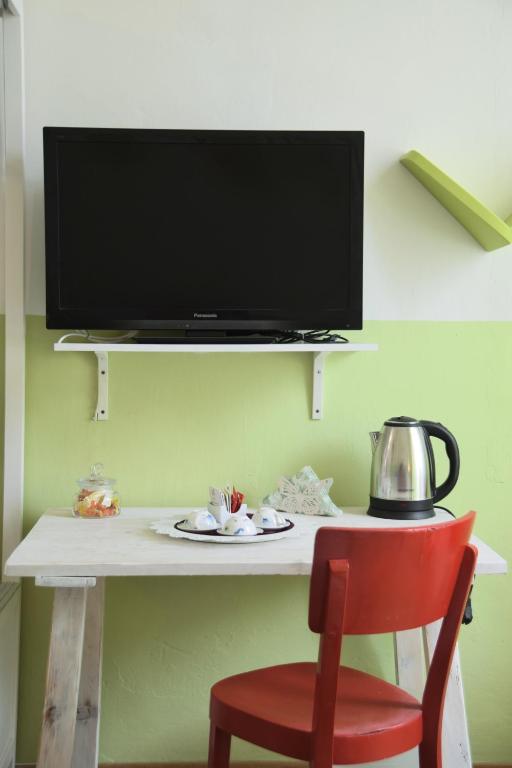 Telewizja i/lub zestaw kina domowego w obiekcie Ottavo Portone