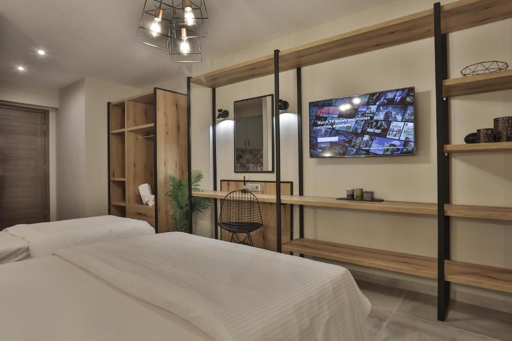 Postel nebo postele na pokoji v ubytování Hotel Hermes Pieria