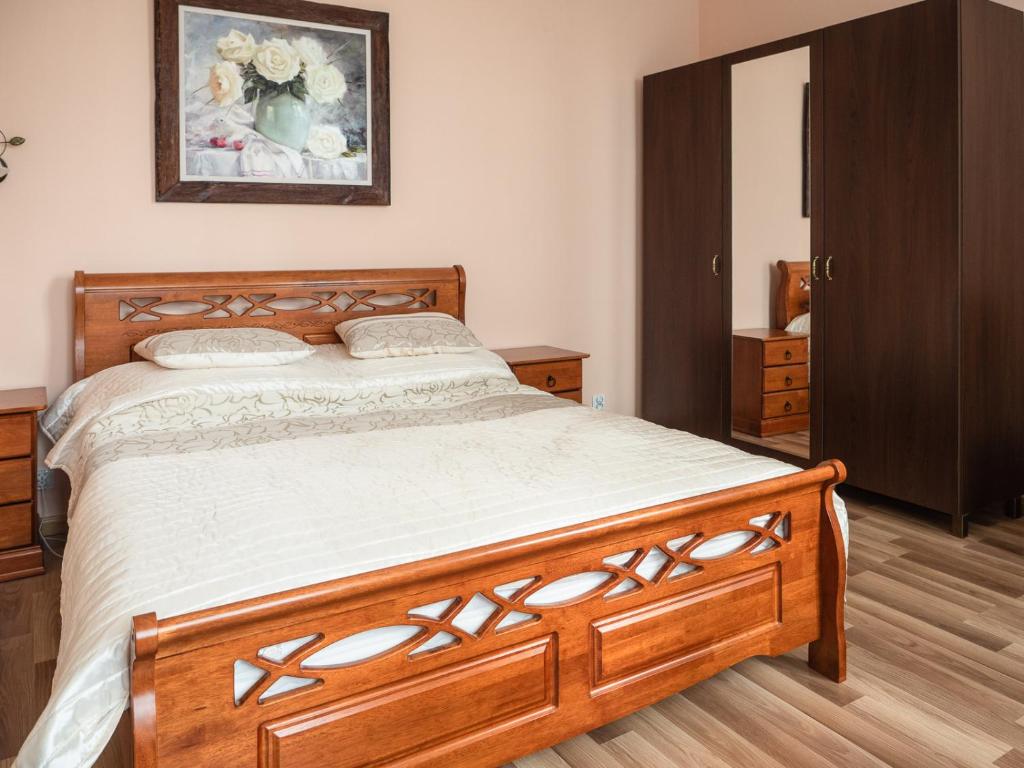 Posteľ alebo postele v izbe v ubytovaní Apartamenty na Cichej 5 a2