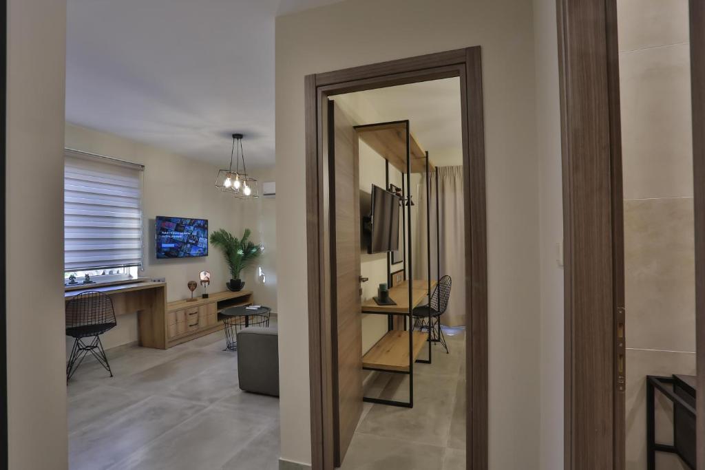 TV a/nebo společenská místnost v ubytování Hotel Hermes Pieria