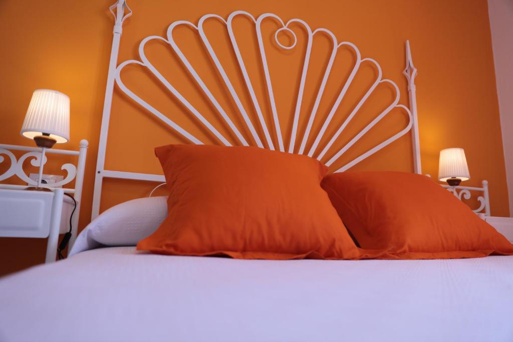 Postel nebo postele na pokoji v ubytování Hotel Las Catedrales