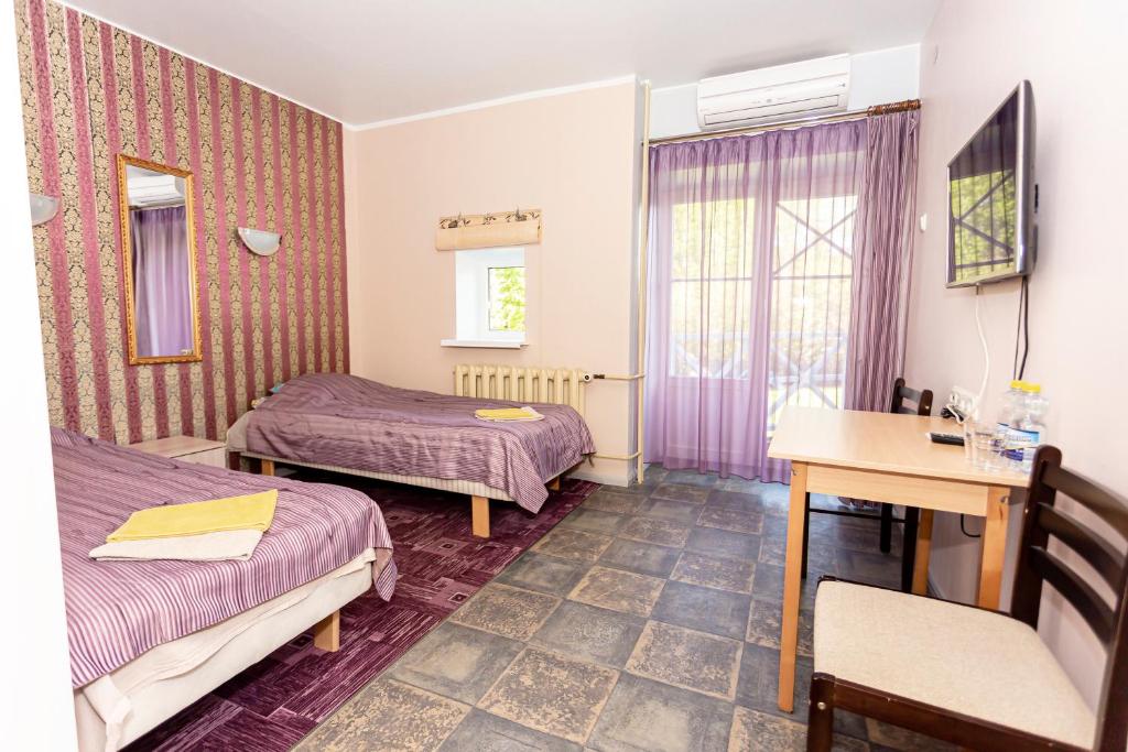 Voodi või voodid majutusasutuse Guest House Rannaliiv toas