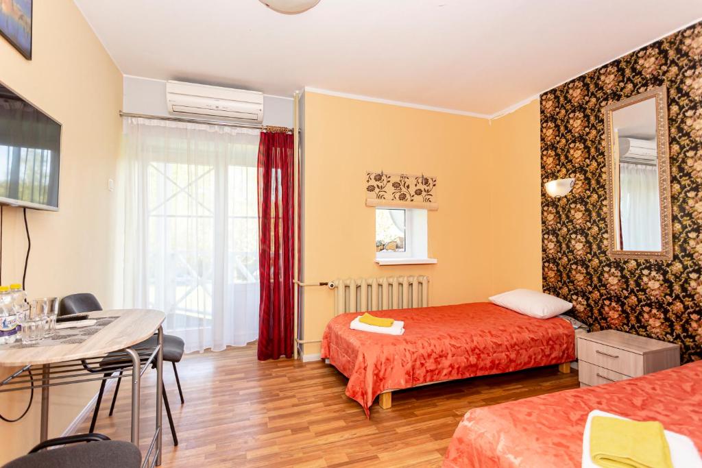 Voodi või voodid majutusasutuse Guest House Rannaliiv toas