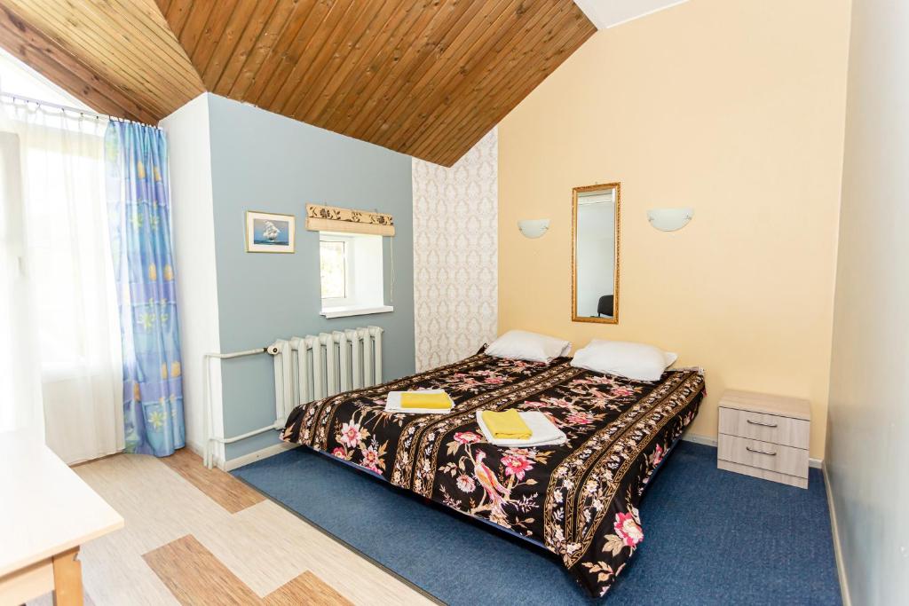 Voodi või voodid majutusasutuse Guest House Rannaliiv toas