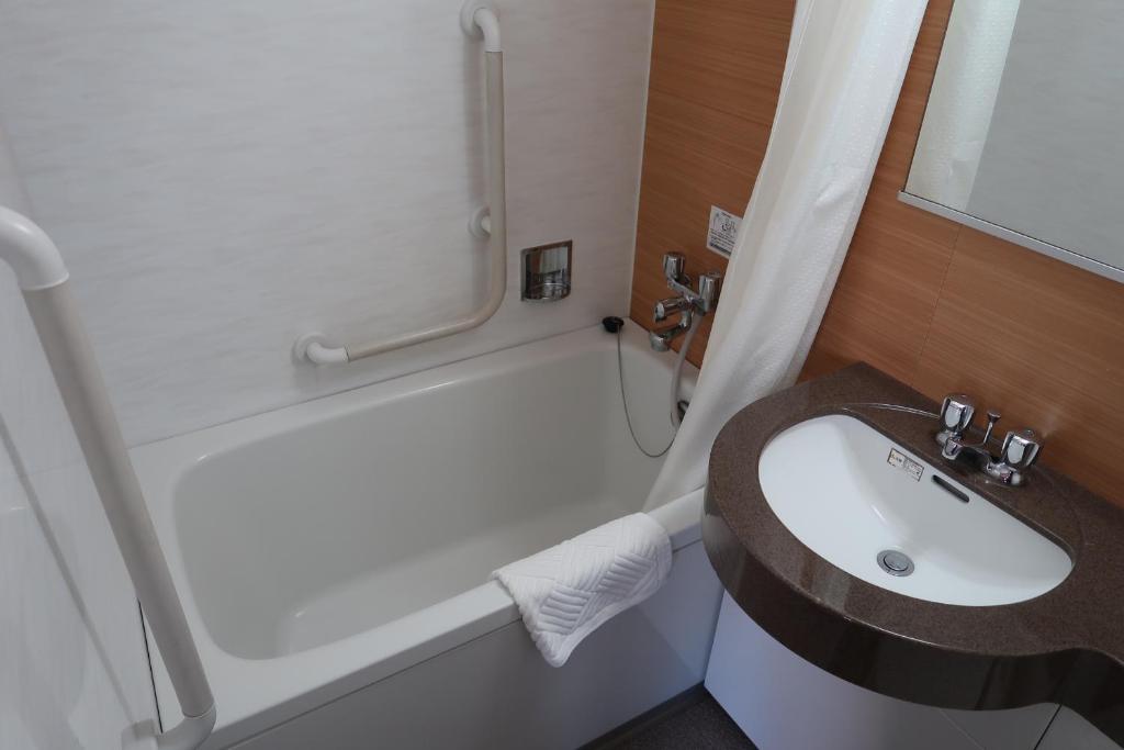 Koupelna v ubytování Ueno Touganeya Hotel