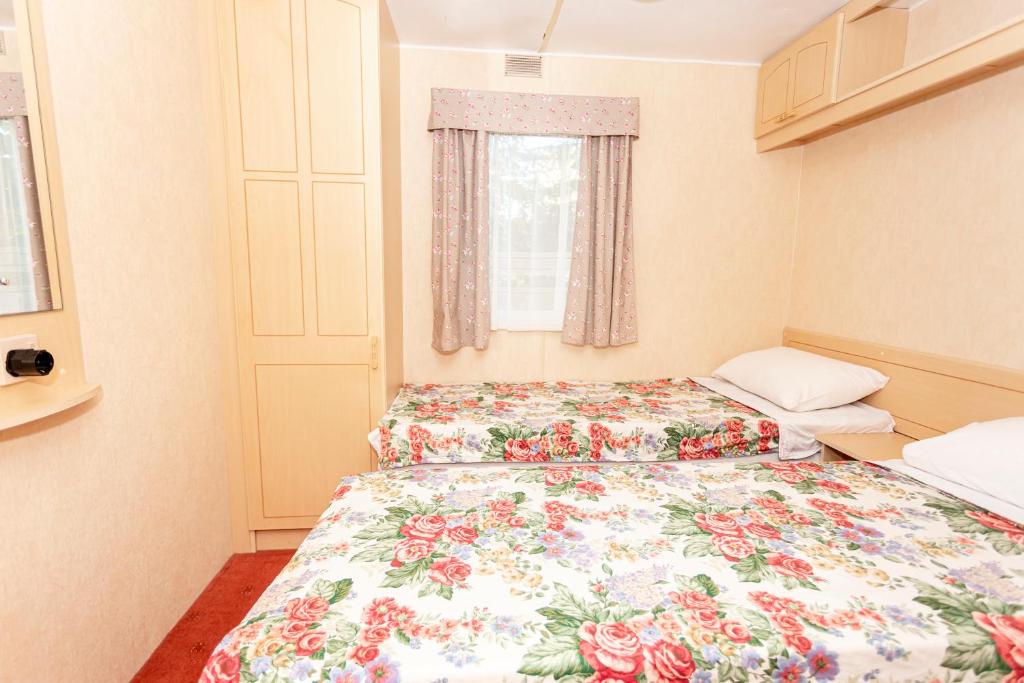 Voodi või voodid majutusasutuse Guest House Rannaliiv toas