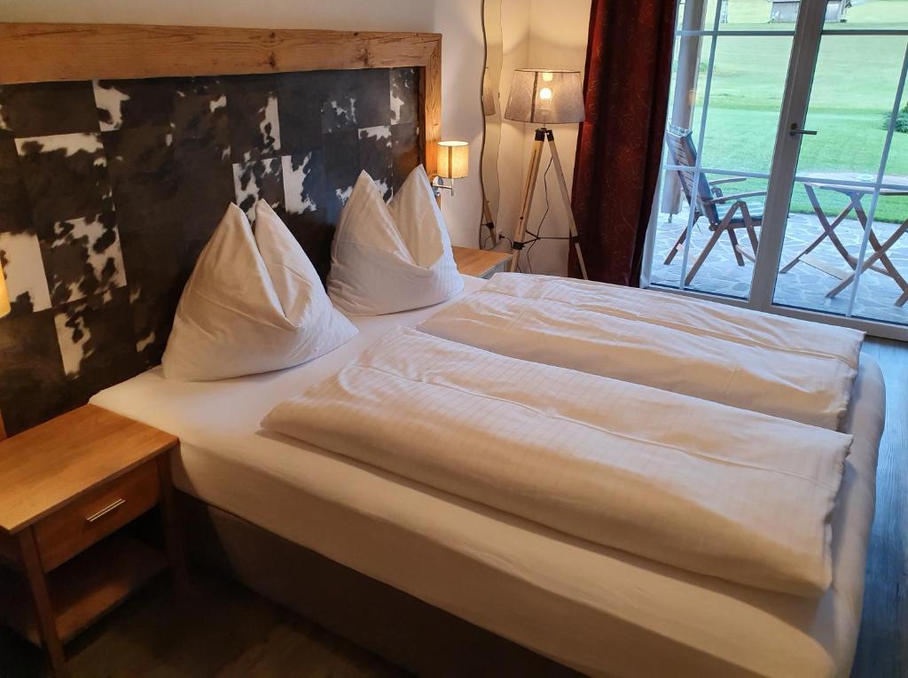 Posteľ alebo postele v izbe v ubytovaní Romantik Pension Lehrberg
