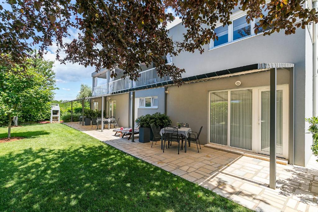 Zahrada ubytování Apartments Dama