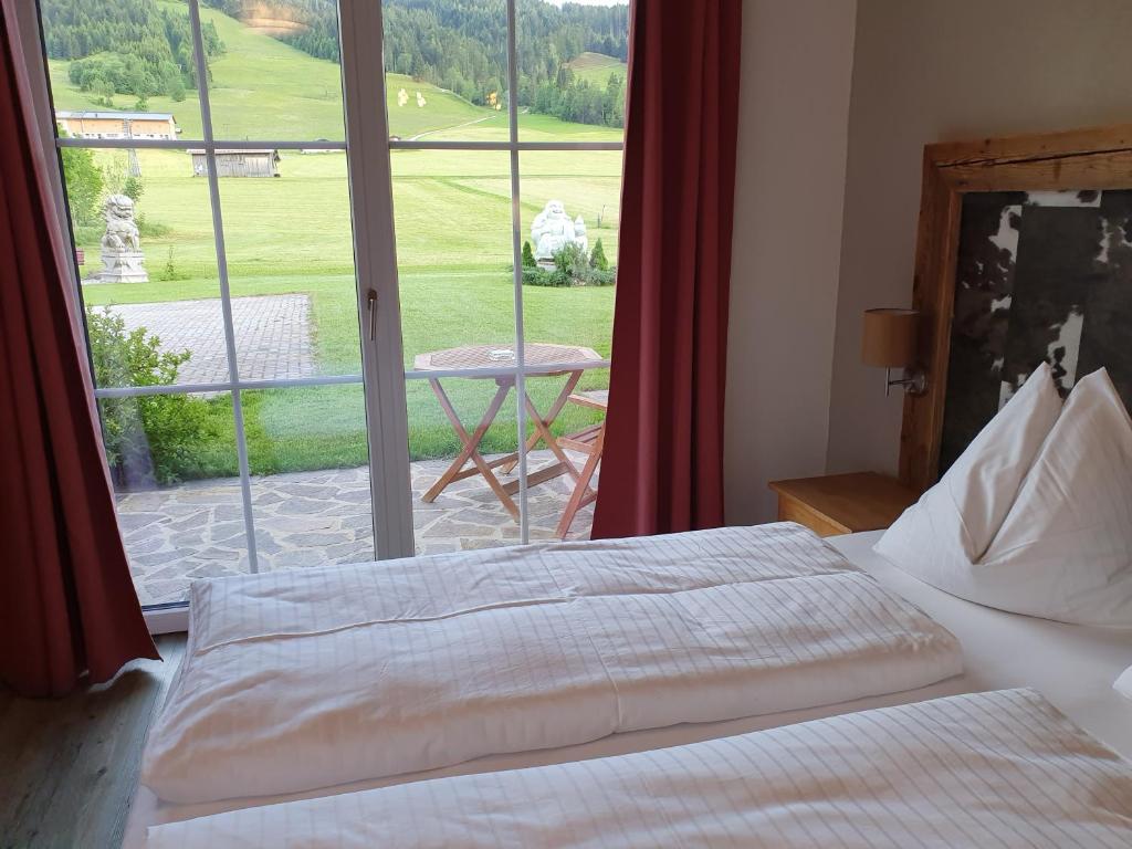 Posteľ alebo postele v izbe v ubytovaní Romantik Pension Lehrberg