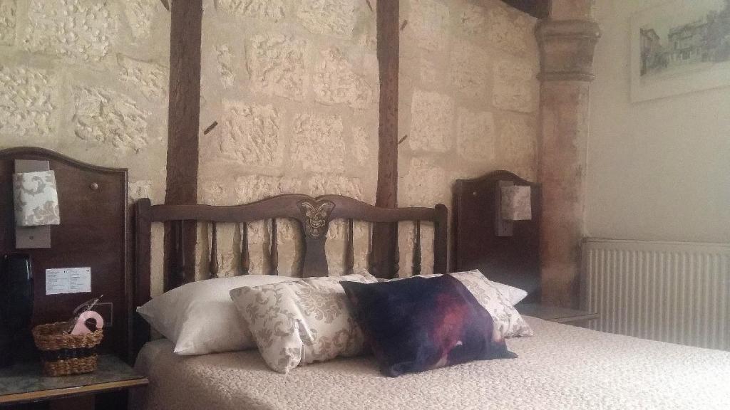 Postel nebo postele na pokoji v ubytování Hotel Mignon