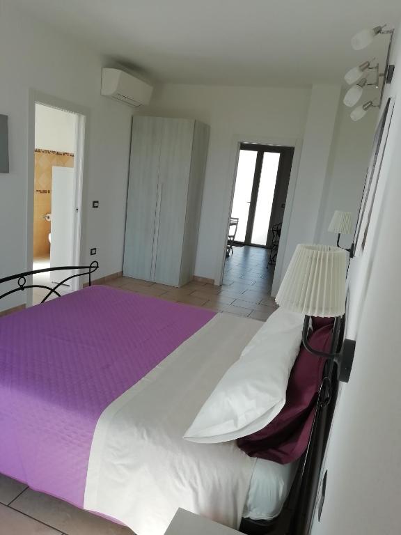 Postel nebo postele na pokoji v ubytování B&B da Zio Lino