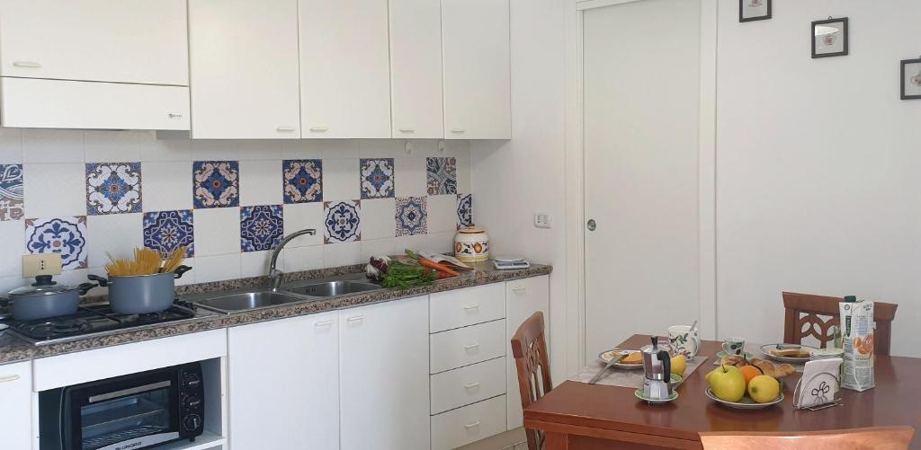 Kuchyň nebo kuchyňský kout v ubytování Casa Athena