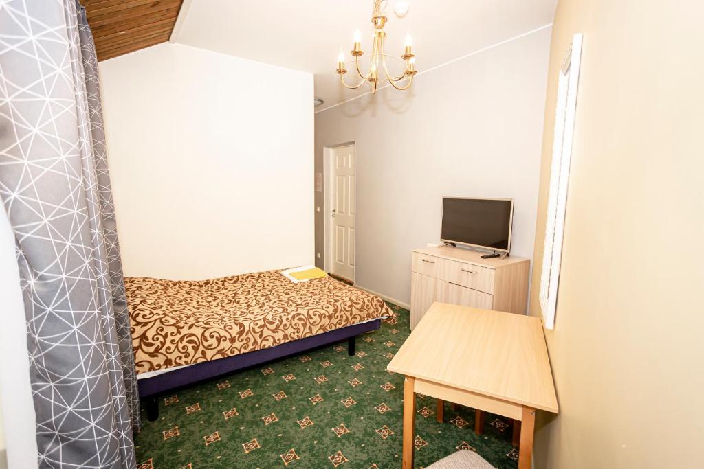 Voodi või voodid majutusasutuse Guest House Rannaliiv toas