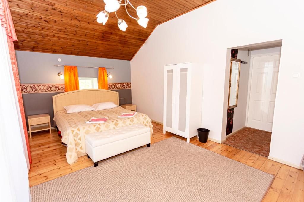 Voodi või voodid majutusasutuse Guest House Rannaliiv toas