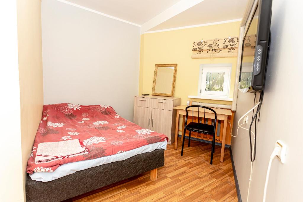 Voodi või voodid majutusasutuse Guest House Rannaliiv toas