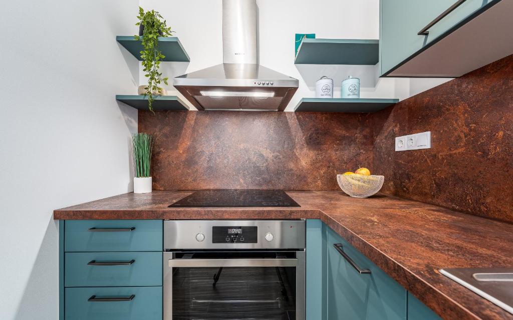 Kuchyň nebo kuchyňský kout v ubytování Apartment Sabbia