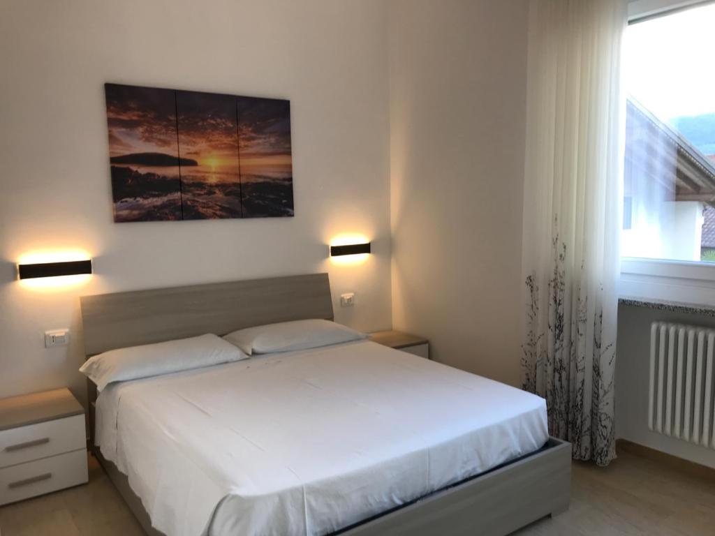 Postel nebo postele na pokoji v ubytování Eagle Rooms