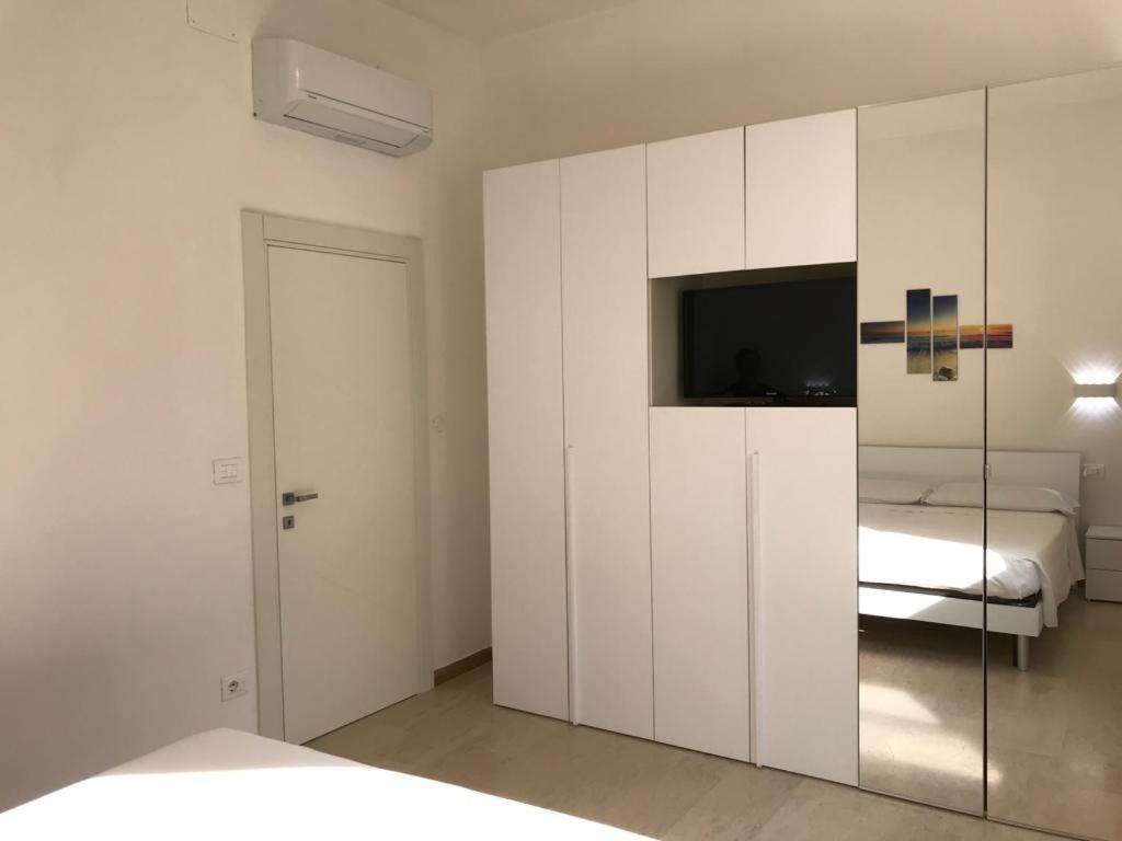Postel nebo postele na pokoji v ubytování Eagle Rooms