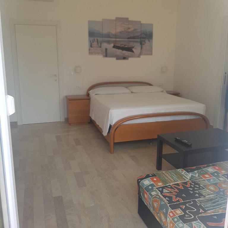 Postel nebo postele na pokoji v ubytování Eagle Rooms