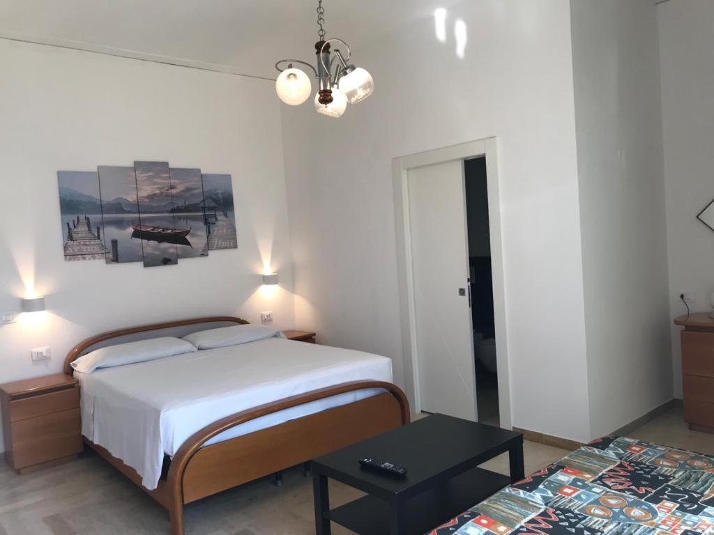 Postel nebo postele na pokoji v ubytování Eagle Rooms