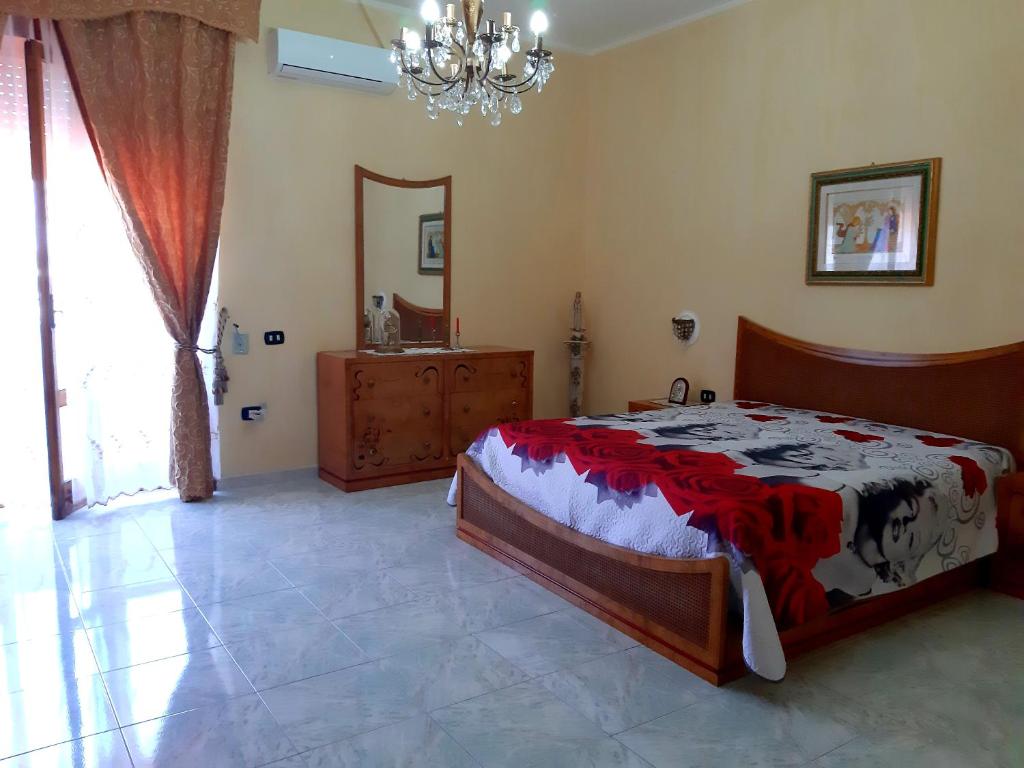 Postel nebo postele na pokoji v ubytování A casa di Roberto