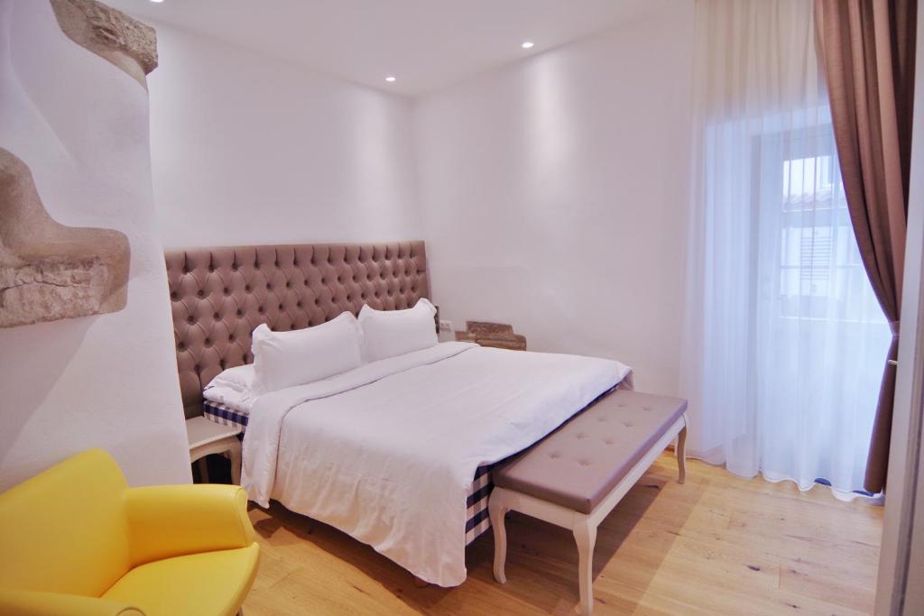 Postel nebo postele na pokoji v ubytování Hotel Regent Tallinn