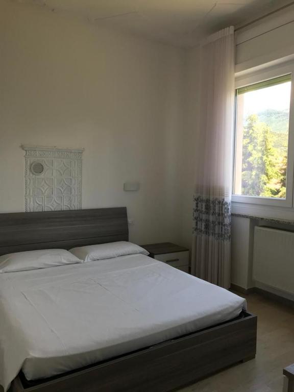 Postel nebo postele na pokoji v ubytování Eagle Rooms