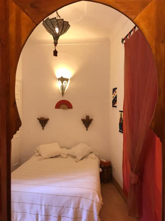 Postel nebo postele na pokoji v ubytování Riad Irene