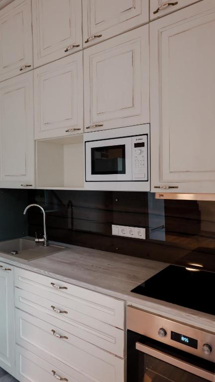 Kuchyň nebo kuchyňský kout v ubytování Õhtu Apartments