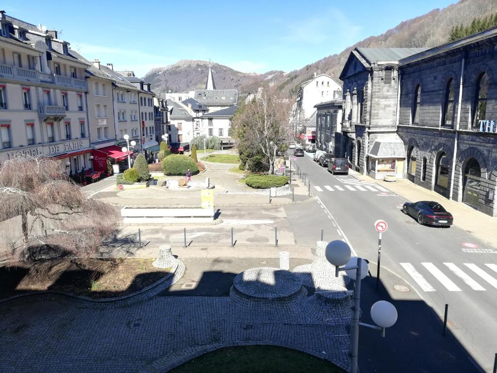 a view of a city with a street and buildings at VILLA DUCHATEL in Le Mont-Dore