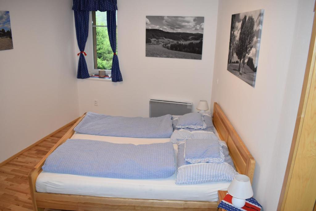 Postel nebo postele na pokoji v ubytování Apartman Razula